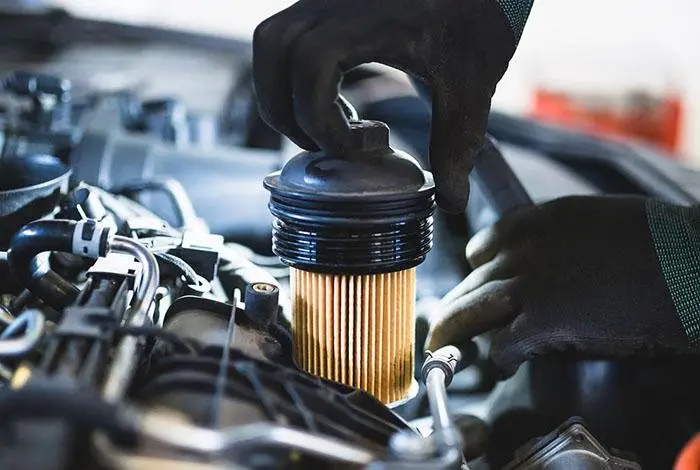What is an oil filter and what does it do