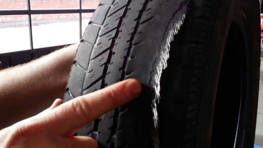 wire showing on tire