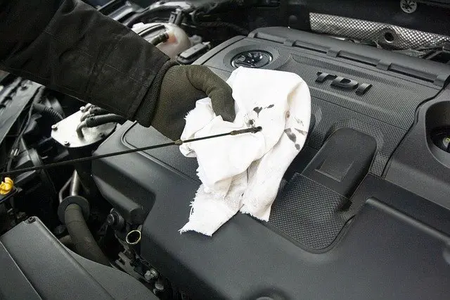 How do you stop your car smoking after oil change