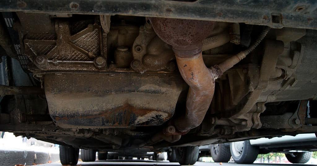 What are some common causes of oil pan damage
