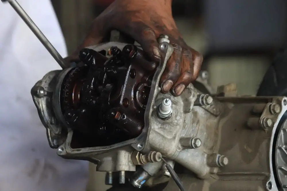 What causes a car to lose oil without leaking or smoking
