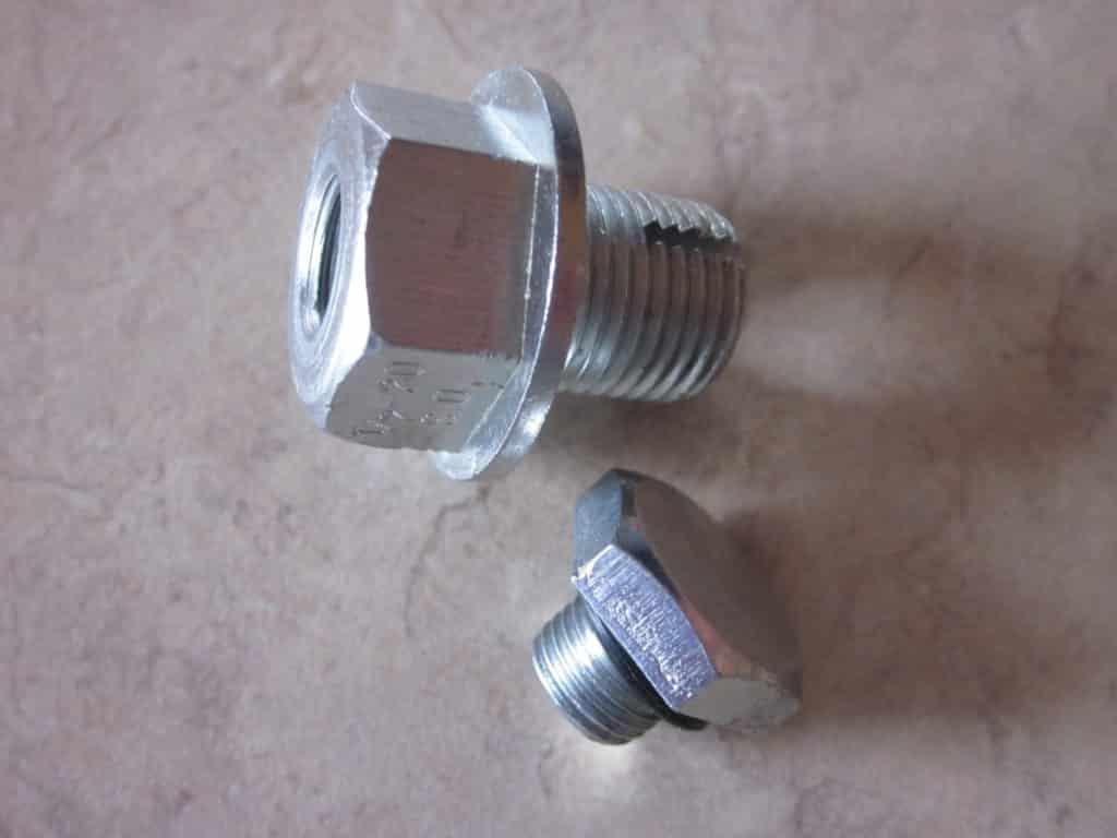What is an oil plug and what does it do